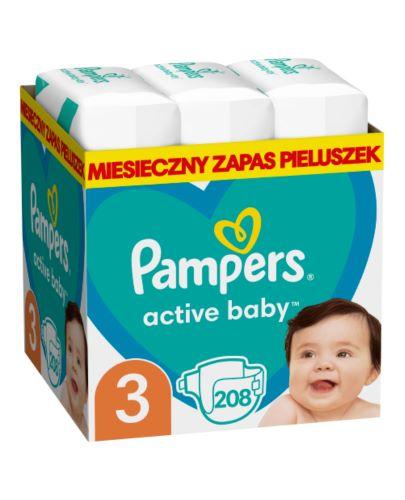 otulacz dla noworodka pampers